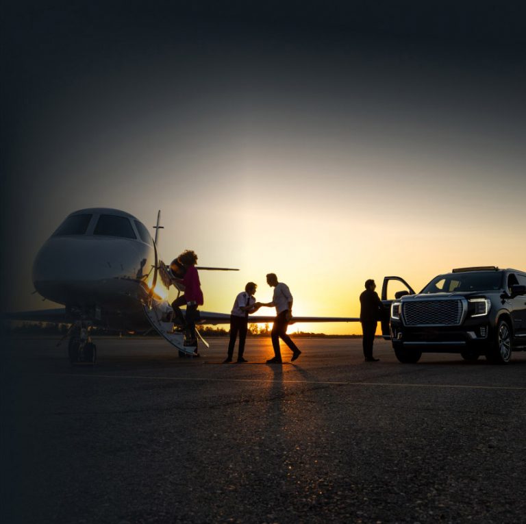 Pilot Welcoming Passengers Into Private Jet